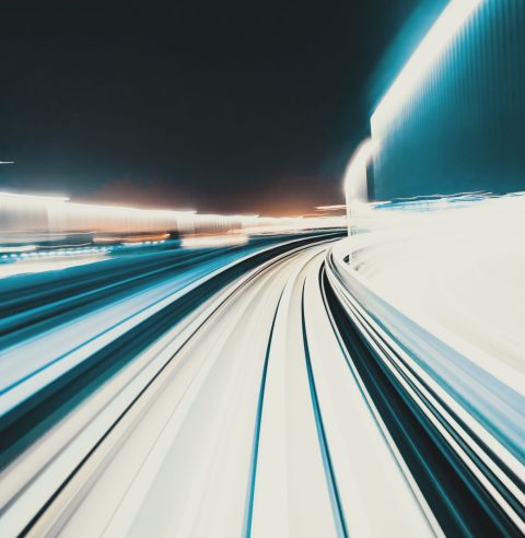 Abstract high speed technology POV train motion blurred concept from the Yuikamome monorail in Tokyo, Japan